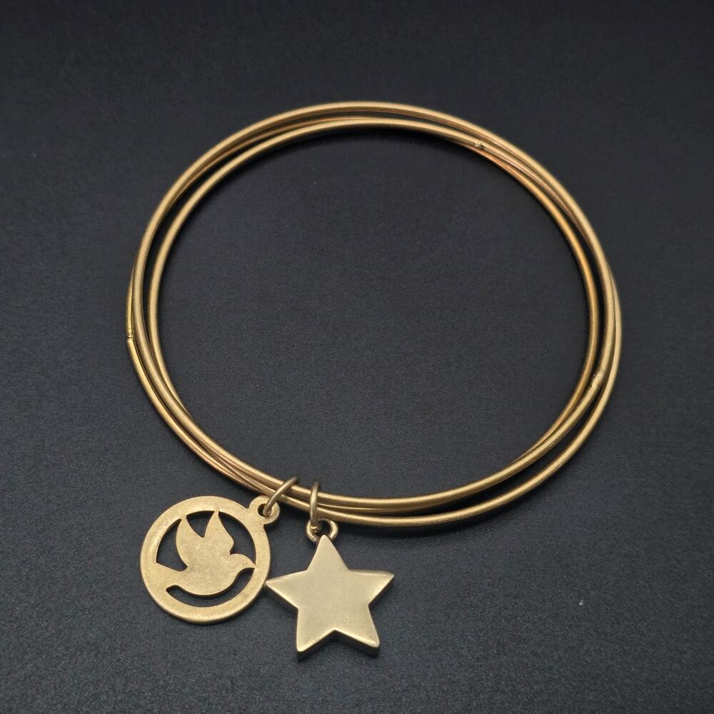 Jessica Simpson Star Dove Bird Charm Bracelet Bangle Gold Tone